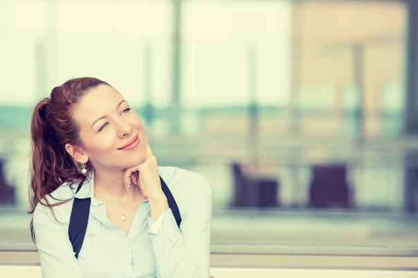 Innovation manager sitting outside and pondering how to make the most of her partnerships.