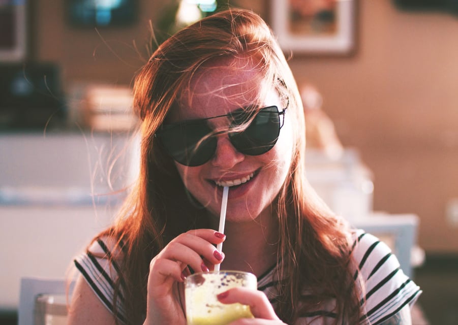 Millennial drinking healthy smoothie